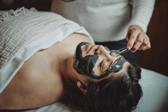 guest enjoying the urban detox face care