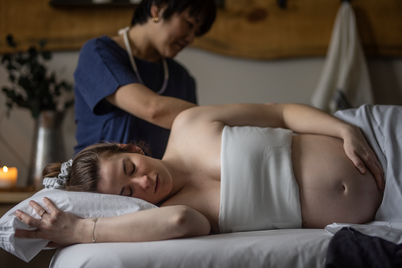 pregnant woman enjoying a massage