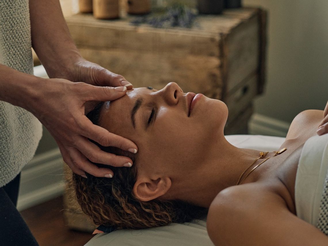 woman receiving a scalp massage