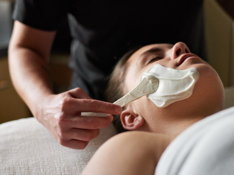 woman enjoying a face care treatment