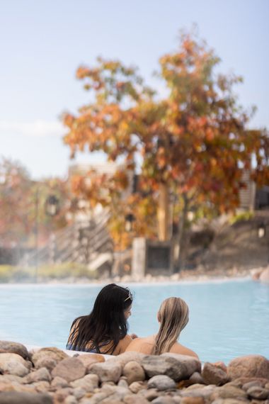 guests resting in a bath during fall season