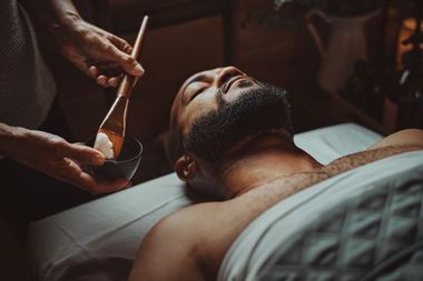 guest laying on a treatment table