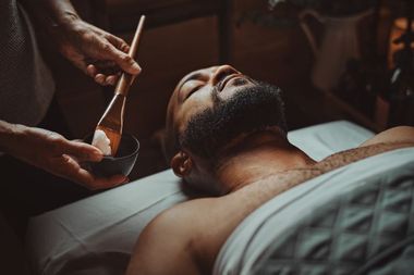 guest resting on a treatment table