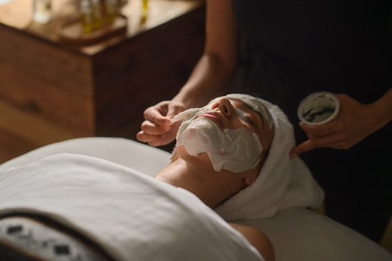 guest enjoying a face care treatment