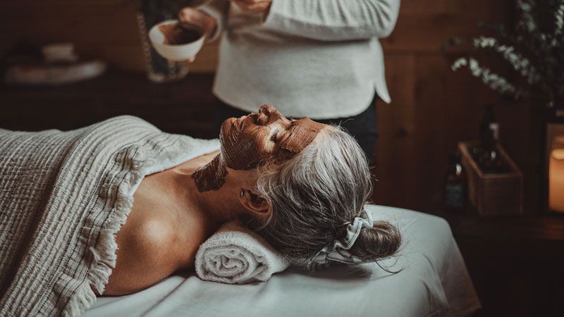 woman enjoying a face care treatment