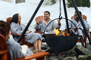 friends around a fire cauldron