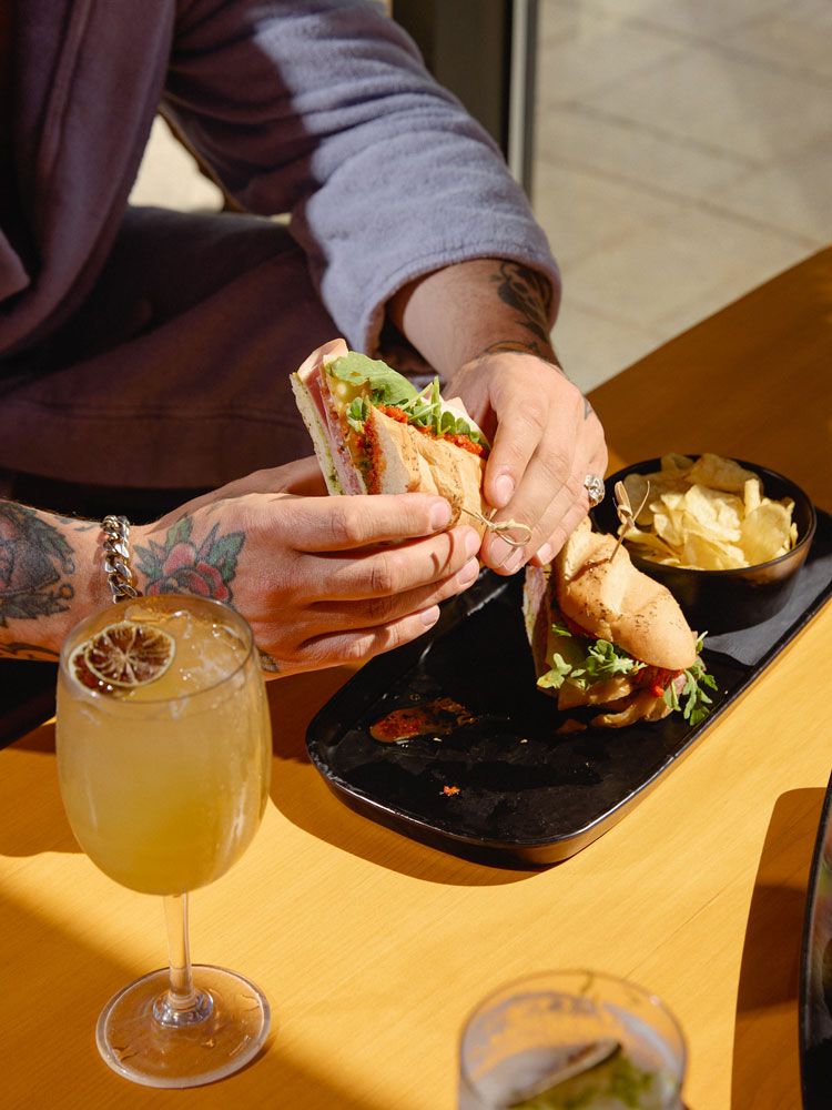 guest eating a sandwich