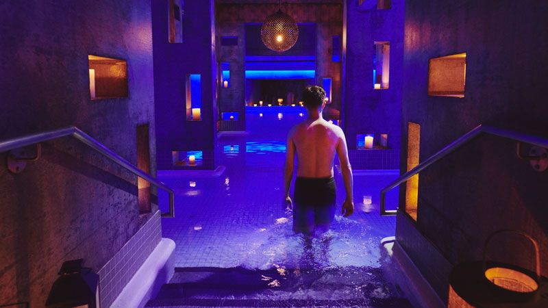 man entering the Kalla flotation pool