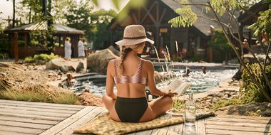 guest reading a book at the spa