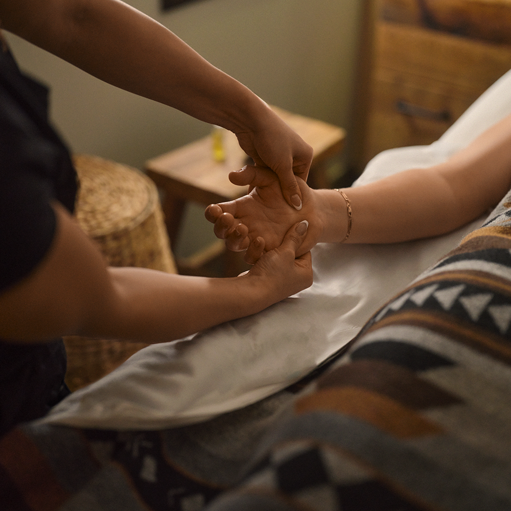 artisan massaging a hand