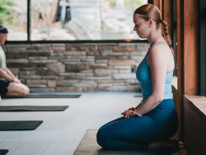 Sandrine teaching a yoga class at the spa