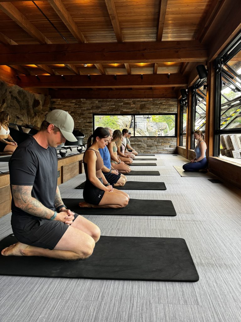 guests doing yoga at the spa