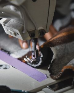 seamstress working on a blanket