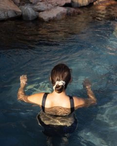 woman bathing in cold water