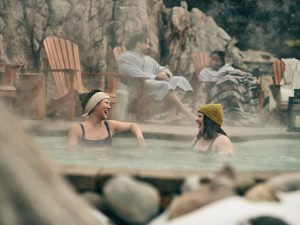 guests discussing in a warm bath